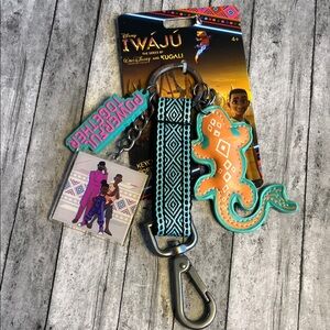 Disney Iwájú Keychain with Orange and Teal Lizard Charm